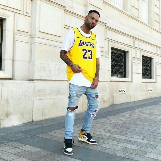 Man wearing a Los Angeles Lakers ujersey